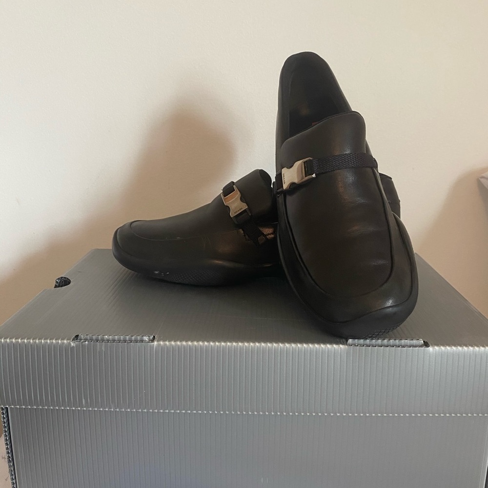 Prada Linea Rossa slip ons